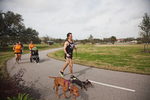 Visitors enjoy a walk along the Big Lake Trail in City Park, New Orleans
